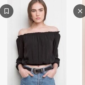 Brandy Melville black long sleeve crop top with elastic waist band. One size